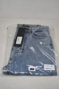 A pair of as new Rokh Pour Femme Pret A Porter jeans (Size 34).