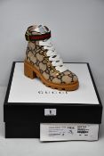 A pair of as new Gucci GG wool ankle boot (EU 34 - RRP £700).