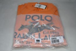 An as new Ralph Lauren hooded sweatshirt in orange (L).