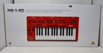 A boxed as new Behringer MS-1-RD Analog Synthesizer.