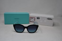 A pair of ladies boxed as new Tiffany & Co. Sunglasses (TF4164 80019S 52).