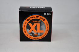 One hundred packs of boxed as new D'Addario EXL 110 Electric Guitar Strings - Regular Light Gauge.
