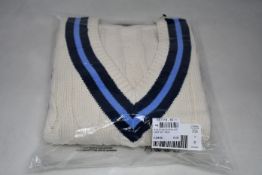 An as new Ralph Lauren Polo cricket cable knit jumper (S).