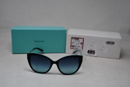 A pair of ladies boxed as new Tiffany & Co. Sunglasses (TF4166 80559S 55).