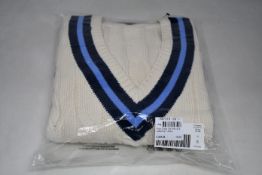 An as new Ralph Lauren Polo cricket cable knit jumper (S).