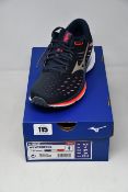 A pair of women's as new Mizuno Wave Rider 24 trainers (UK 6).