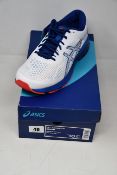 A pair of as new Asics Gel-Kayano 25 trainers (UK 9).