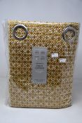 A pair of as new John Lewis & Partners Rona weave ochre eyelet curtains (RRP £180.00).