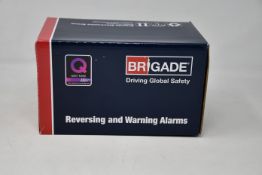 A boxed as new Brigade SA-BBS-107 A1400 White Sound Reversing Alarm (12-24Vdc - 87-107dB(A)).