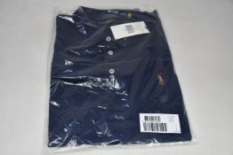 Two as new Ralph Lauren polo shirts in navy (XL).