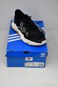 A pair of women's as new Adidas Ozweego trainers (UK 5.5).