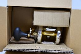 A boxed as new Shimano Talica 25ii 2-speed fishing reel (TAC-25IICAM).