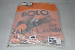 An as new Ralph Lauren hooded sweatshirt in orange (S).