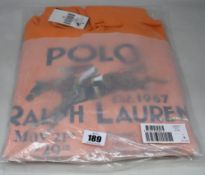 An as new Ralph Lauren hooded sweatshirt in orange (M).