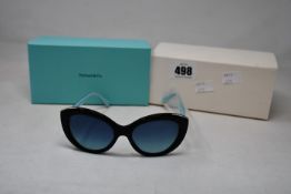 A pair of ladies boxed as new Tiffany & Co. Sunglasses (TF4151 80019S 54).