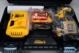 An as new DeWalt DCD796 Brushless Combi Drill with battery, charger and case (Case needs a clean).