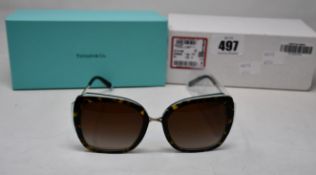 A pair of ladies boxed as new Tiffany & Co. Sunglasses (TF4160 82863B 54).