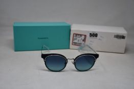 A pair of ladies boxed as new Tiffany & Co. Sunglasses (TF3061 60019S 64).
