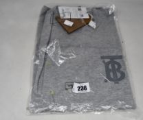 An as new Burberry Emerson monogramed top in grey (M - RRP £350 - Please note item has security