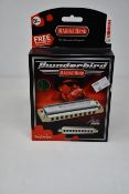 Five boxed as new Hohner Thunderbird marine band harmonicas (Four in Bb low, one in F low).