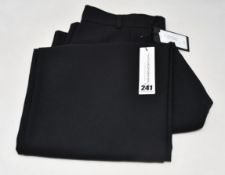 A pair of as new Edward Crutchley black suit style trousers (M).