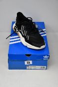A pair of women's as new Adidas Ozweego trainers (UK 4.5).