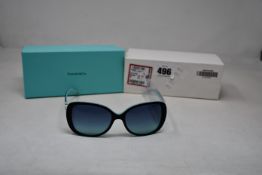 A pair of ladies boxed as new Tiffany & Co. Sunglasses (TF4121B 80559S 55).