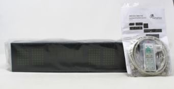 A boxed as new Wharton 4000x series LED calendar clock (46cm version) (Requires UK adapter)