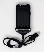 A pre-owned Motorola TC55 Mobile Android Computer Barcode Scanner (USB charger cable included).
