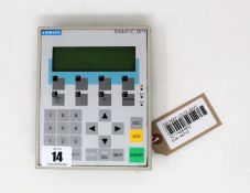 A pre-owned Siemens Simatic OP7 Operator Panel (P/N: 6AV3607-1JC20-0AX1) (Back panel loose.