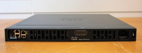 A boxed as new Cisco 4331 Integrated Services Router (P/N: ISR4331/K9) (Box opened, some damage to