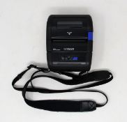 A pre-owned Citizen CMP-30BT Portable Bluetooth Label Printer with Citizen CMP-BA30 Battery Pack (