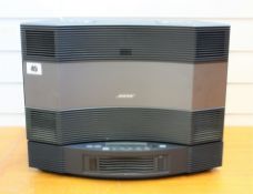 A pre-owned Bose Acoustic Wave II music system and multi disc changer (remote not included, power