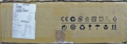 A boxed Juniper Networks SRX2400 services gateway (box opened)