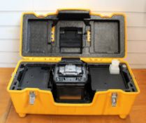 A pre-owned Fujikura 90S Core Alignment Single Fusion Splicer (power supply, quick reference guide