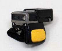 A pre-owned Zebra RS5100 Bluetooth Ring Finger Barcode Scanner (No charger included).