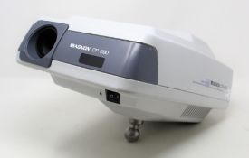 A pre-owned Magnon CP-690 Auto Chart Projector (Powers on, not tested further) (No cables or other