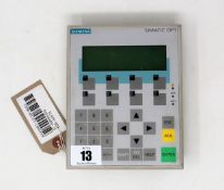 A pre-owned Siemens Simatic OP7 Operator Panel (P/N: 6AV3607-1JC20-0AX1) (Untested, sold as seen).