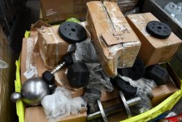 A quantity of gym weights and related items.