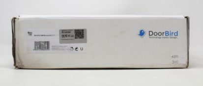 A boxed as DoorBird D2101V Flush-Mount IP Video Door Station in V4A Brass Polished Stainless