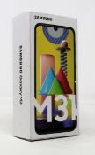 A boxed as new Samsung Galaxy M31 M315F-DSN 64GB in Black (Box sealed) (Checkmend report ID: