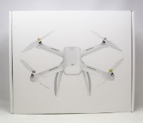 A boxed as new Xiaomi Mi 4K Quadcopter Drone (m/n: WRJTZ02FM) (UK plug adaptor required).