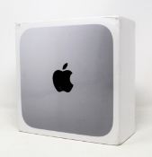 A boxed as new Apple Mac Mini (2020) computer in silver with Apple M1 CPU, 8GB RAM, 256GB SSD. (Some