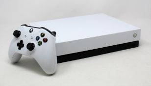 A pre-owned 1TB Xbox One X in white (includes controller but no cables or power supply)