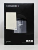 A boxed pre-owned x-rite i1 Display Pro monitor colour calibration device (box damaged)
