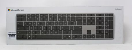 Four boxed as new Microsoft Surface Keyboards in Grey (Portuguese language layout) (P/N: 3YJ-00011