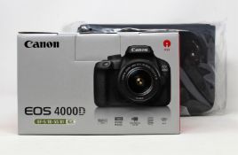 A boxed as new Canon EOS 4000D SLR Digital Camera with EF-S 18-55mm III Lens,Shoulder Bag and 16GB