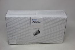 A boxed as new Philips Zoom! Chairside Light-Activated Whitening Kit (EXP: 12/2021).