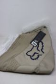 A pair of as new Fox 360 Speyer Motocross Pants in sand (36).