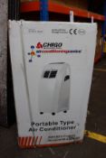 A boxed Chigo Portable Type Type Air Conditioner KYR-25CO/AG.